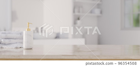Luxury white marble tabletop with copy space over blurred clean and bright bathroom Luxury white marble tabletop with copy space over blurred clean and bright bathroom 96354508