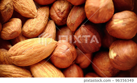 A mixture of almonds and hazelnuts in close-up A mixture of almonds and hazelnuts in close-up 96356349
