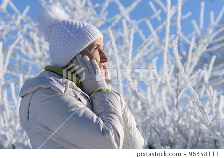 Old woman in a fur coat in the winter  Old woman in a fur coat in the winter  96358111