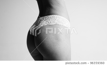 Beautiful sexy lady in elegant panties and bra. Fashion portrait of model on white background, close-up. 96359360