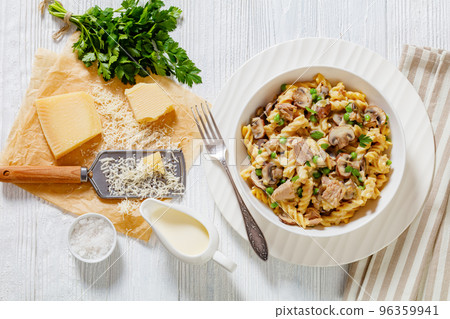tuna mushroom green pea fusilli with sauce tuna mushroom green pea fusilli with sauce 96359941