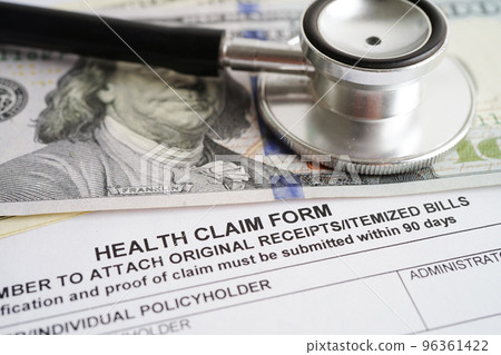 Health claim form with stethoscope and US dollar banknotes, insurance accident medical concept. Health claim form with stethoscope and US dollar banknotes, insurance accident medical concept. 96361422