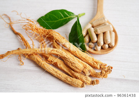 Lingzhi or Reishi mushroom with capsules, organic natural healthy food. Lingzhi or Reishi mushroom with capsules, organic natural healthy food. 96361438