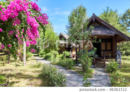 Tropical bungalow - traditional house which use natural material Tropical bungalow - traditional house which use natural material 96361512
