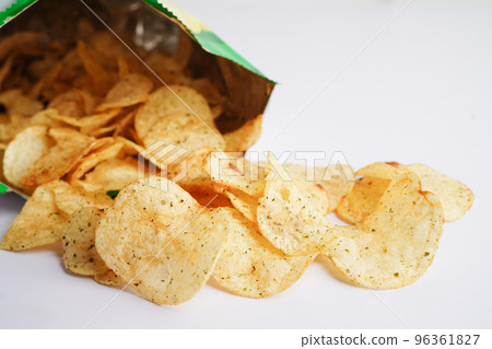 Potato chips in open bag, delicious BBQ seasoning spicy for crips, thin slice deep fried snack fast food in open bag. 96361827