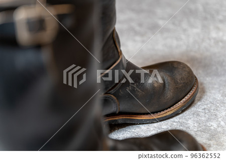 Redwing 2268 PT91 brown core engineer boots background concrete Redwing 2268 PT91 brown core engineer boots background concrete 96362552