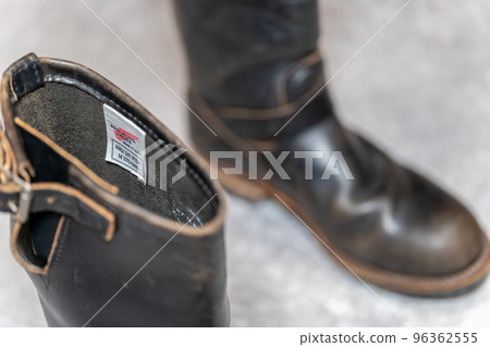 Redwing 2268 PT91 brown core engineer boots background concrete Redwing 2268 PT91 brown core engineer boots background concrete 96362555