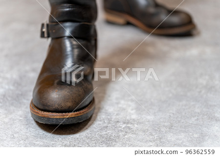 Redwing 2268 PT91 brown core engineer boots background concrete Redwing 2268 PT91 brown core engineer boots background concrete 96362559