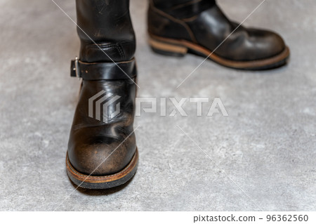 Redwing 2268 PT91 brown core engineer boots background concrete 96362560