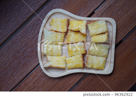 top view milk toast with sugar on a wooden floor background, food, dessert, health, copy space 96362922
