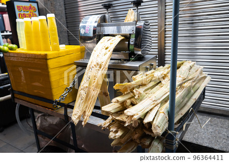 Cane making juice machine at the bar Cane making juice machine at the bar 96364411
