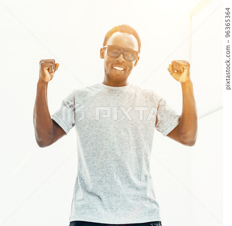 successful stylish guy in sunglasses. isolated on white successful stylish guy in sunglasses. isolated on white 96365364