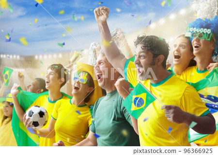 Brazil football team supporter on stadium. 96366925