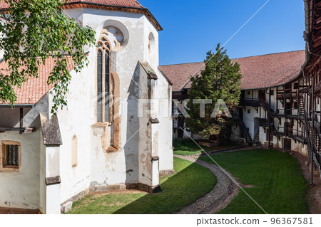 Fortified Prejmer church of 13 century built on Romanesque basilica surrounded by defensive wall 96367581