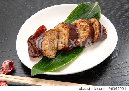 Ikameshi, a local dish of the Oshima region of Hokkaido Ikameshi, a local dish of the Oshima region of Hokkaido 96369964