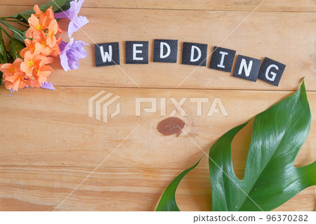 Wedding text on wood table , love concept. Wedding text on wood table , love concept. 96370282