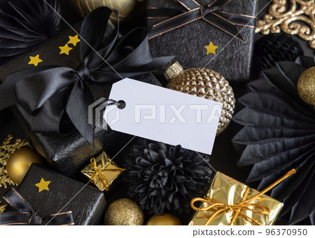 Black and golden Christmas Gift Boxes and ornaments, horizontal gift tag Mockup 96370950