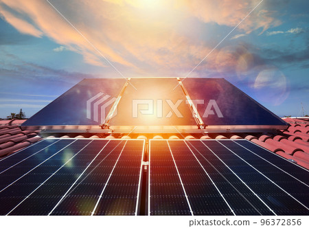 Renewable energy system with solar panel for electricity and hot water 96372856