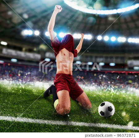Successful soccer player wins the football match Successful soccer player wins the football match 96372871