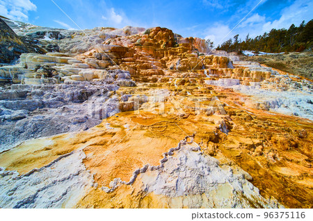 Winter in Yellowstone brings snowy terraces at hot springs 96375116