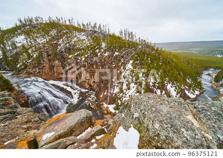 Wide angle on cliffs of stunning Gibbon Falls in Yellowstone 96375121