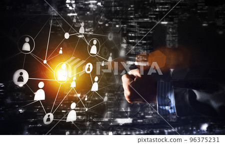 Creating modern wireless technologies as means of communucation and networking on dark background Creating modern wireless technologies as means of communucation and networking on dark background 96375231