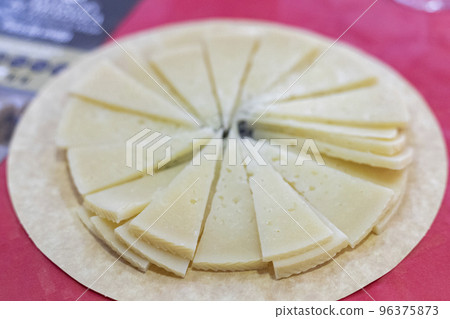 Cheese. Sheep cheese plate. Triangle cheese. Horizontal photography. Cheese. Sheep cheese plate. Triangle cheese. Horizontal photography. 96375873