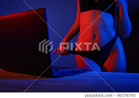Woman in lingerie records a movie for web portal Woman in lingerie records a movie for web portal 96376793