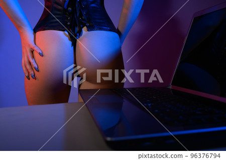 Woman in lingerie records a movie for web portal Woman in lingerie records a movie for web portal 96376794