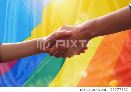 Sunny Ukraine and peace flag with helping hand as support Sunny Ukraine and peace flag with helping hand as support 96377862