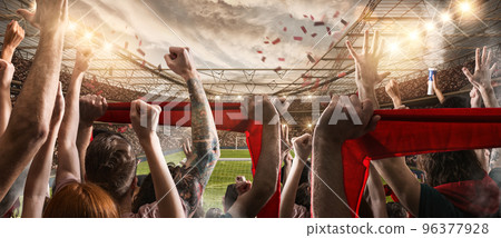 Football scene with cheering audience at the stadium Football scene with cheering audience at the stadium 96377928