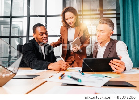 Group of business people have a meeting about company stats 96378296