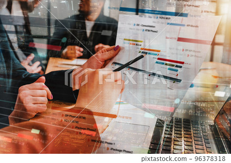 Group of business people have a meeting about company stats Group of business people have a meeting about company stats 96378318