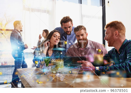 Business teamwork works with a tablet with internet streaming service Business teamwork works with a tablet with internet streaming service 96378501