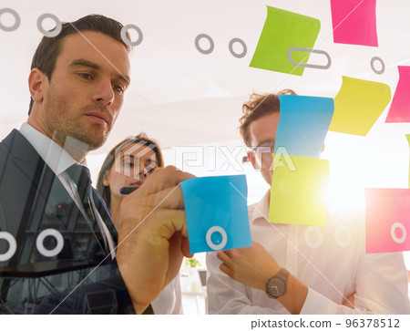 Team of happy people work together as teamwork and partner 96378512