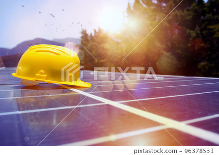 Helmet over installed solar panels on the roof Helmet over installed solar panels on the roof 96378531