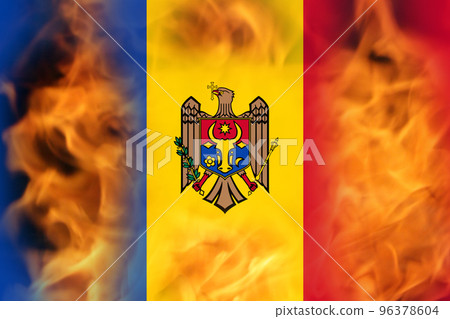 Defocus protest in Moldova. Moldova flag painted on fire flame background. Strength, Power, Protest concept. Russia war. World crisis. Out of focus Defocus protest in Moldova. Moldova flag painted on fire flame background. Strength, Power, Protest concept. Russia war. World crisis. Out of focus 96378604