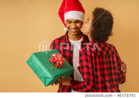 Happy man has received a christmas gift from his girlfriend 96378791