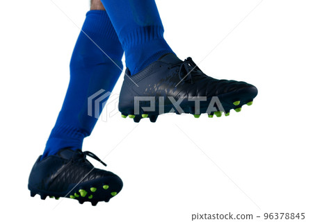 Isolated Soccer player ready to kicks the ball 96378845