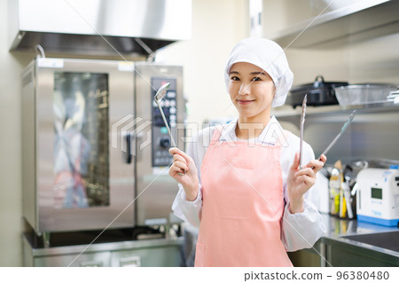 young female cook young female cook 96380480