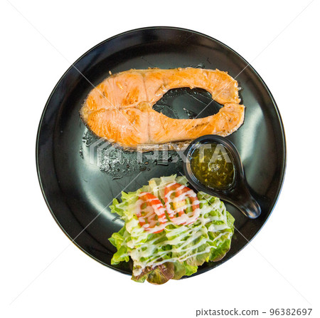 Top view of Salmond steak with mix salad mayonnaise, focus selective Top view of Salmond steak with mix salad mayonnaise, focus selective 96382697