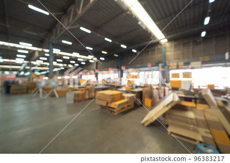 Blurry bokeh abstract background of interior of large warehouse retail store industry. Rack of furniture and home accessories stock storage. Interior of cargo in ecommerce and logistic concept. Depot Blurry bokeh abstract background of interior of large warehouse retail store industry. Rack of furniture and home accessories stock storage. Interior of cargo in ecommerce and logistic concept. Depot 96383217