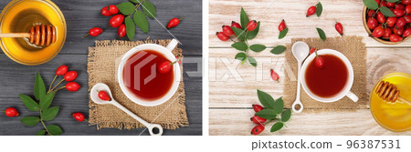 tea with rose hips on black wooden background. Top view tea with rose hips on black wooden background. Top view 96387531