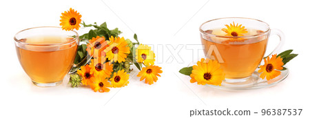 Calendula tea with fresh flowers isolated on white background Calendula tea with fresh flowers isolated on white background 96387537