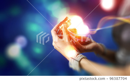 Closeup hands giving surprise gift box Closeup hands giving surprise gift box 96387704
