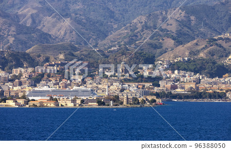 Downtown City by the Sea with mountain background. Messina, Sicilia, Italy. Downtown City by the Sea with mountain background. Messina, Sicilia, Italy. 96388050