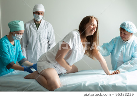 Child birth process, helping personal during labour Child birth process, helping personal during labour 96388239
