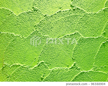 Horizontal background image of the color wall of the yellow-green clay wall with trowel marks 96388904