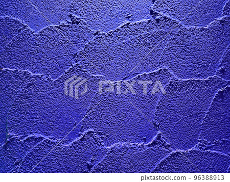 A horizontally long background image of a color wall of a dark navy blue clay wall with trowel marks 96388913