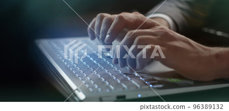 Male hands on a computer keyboard close-up. Male hands on a computer keyboard close-up. 96389132